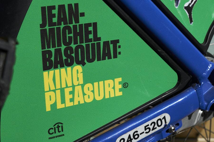 Closeup of a Citi Bike adorned with Basquiat imagery