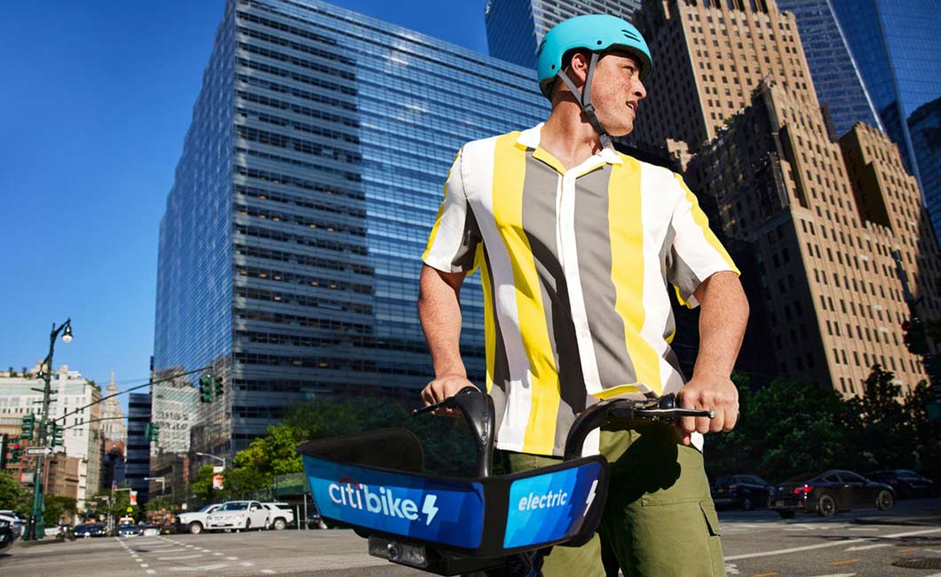 A man pauses while on a Citi Bike bicycle ride