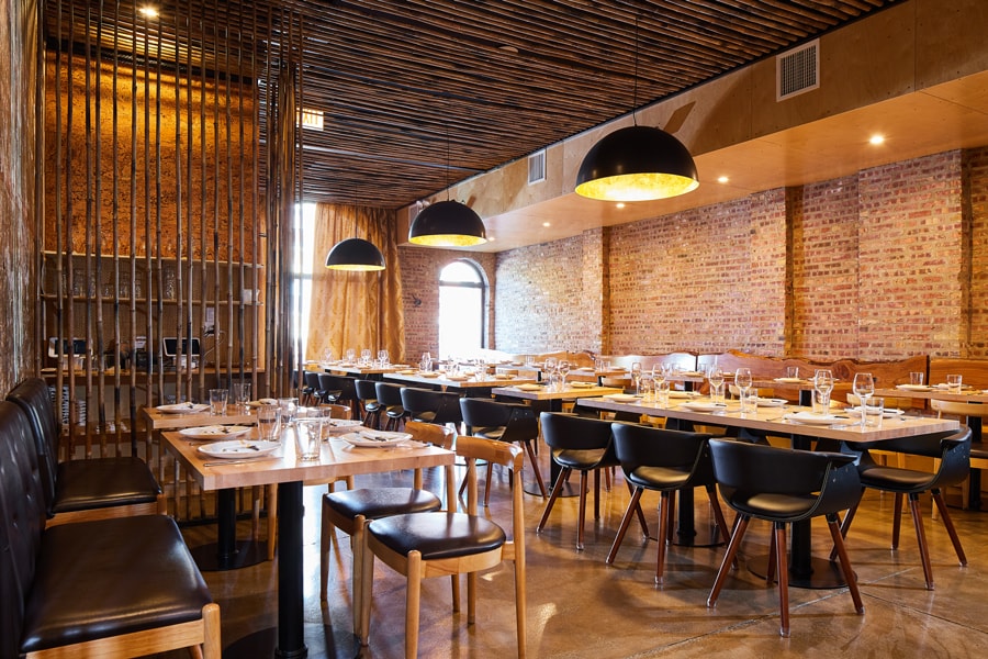 Table and chairs at the interior of HaiSous 