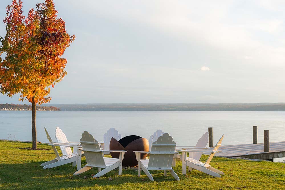 chairs in a circle overlooking a lake