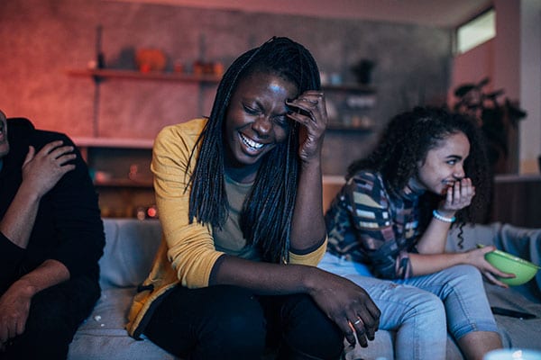 woman laughing with friends